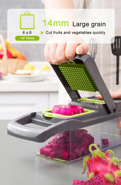 Vegetable chopper dicing fruit into the container