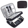 Travel cable organizer roll holding chargers and cords