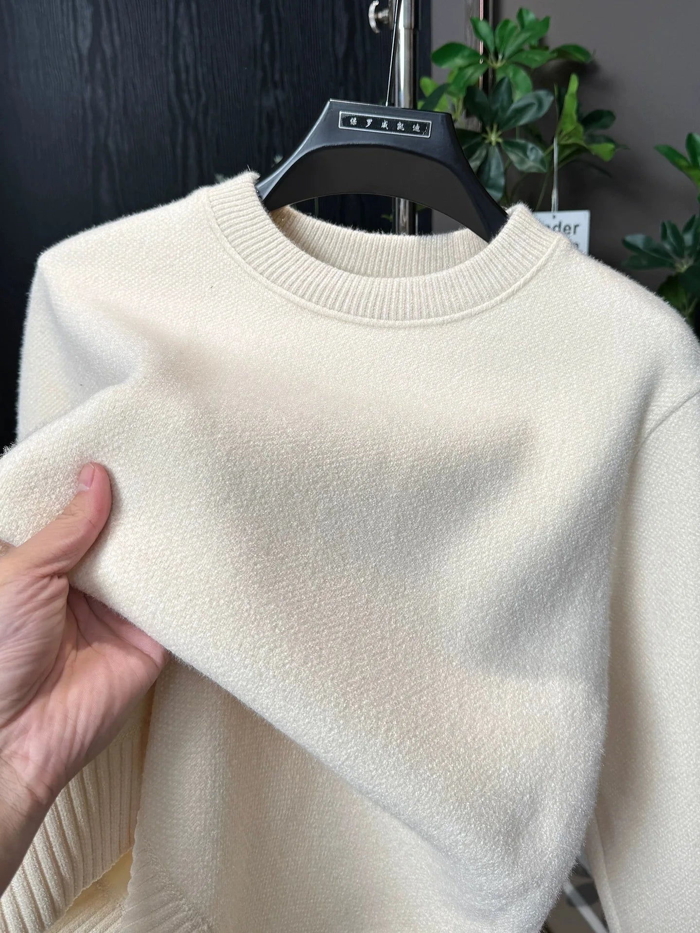 Round-neck knit sweater on model